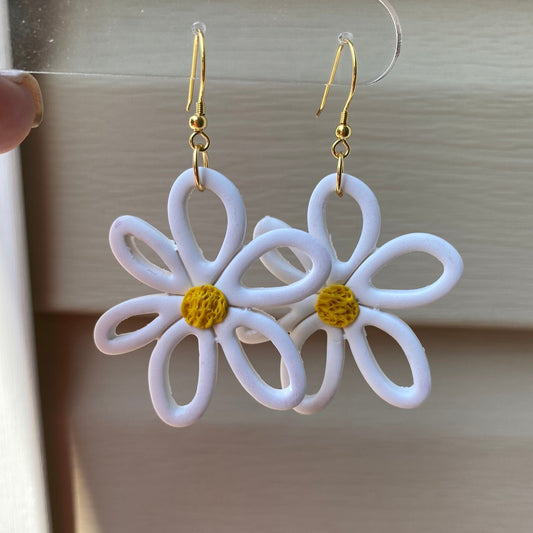 White flower daisy with yellow center polymer clay dangle earrings