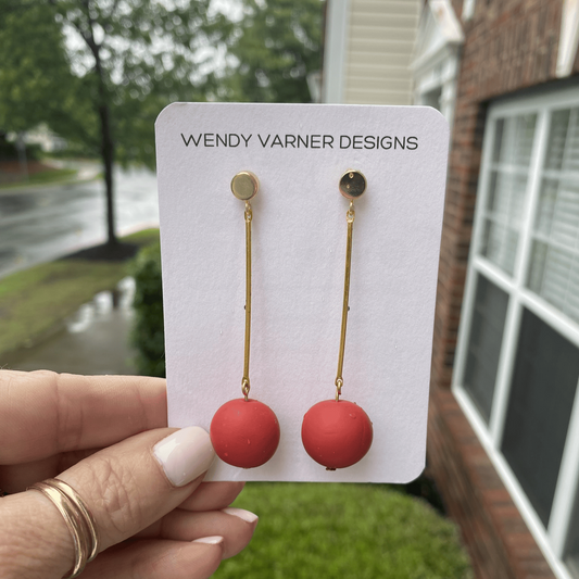 Terracotta matte polymer clay earrings with minimalist gold bar design