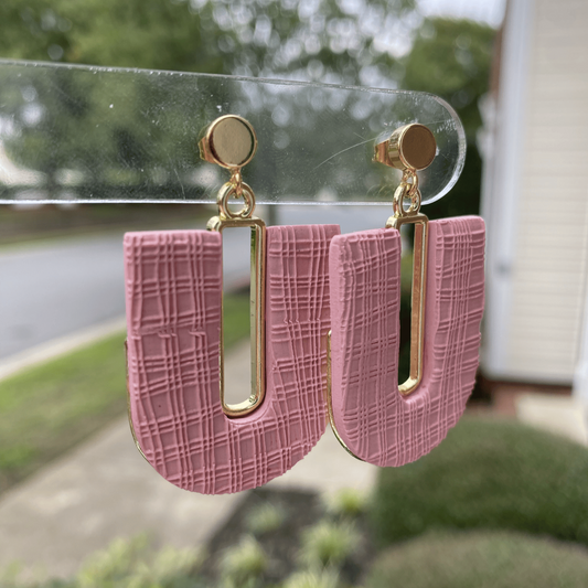 Rose blush polymer clay arch earrings with mismatched red and gold posts, featuring gold-plated rectangle accents, handcrafted in Charlotte NC by Wendy Varner Designs.