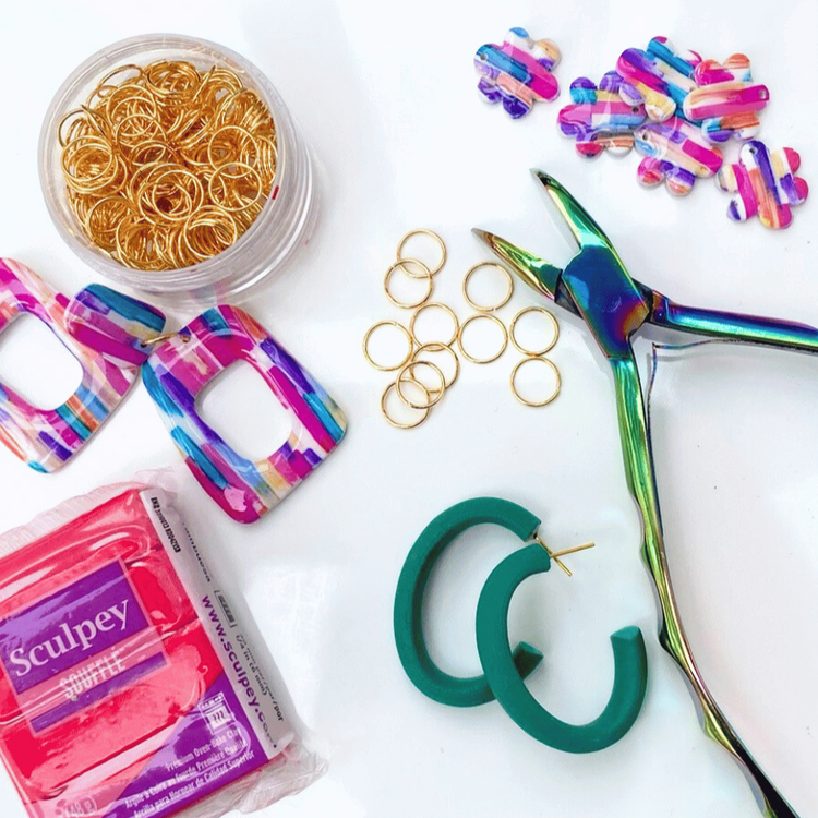 Flat lay of polymer clay earring components and jewelry-making tools, representing hands-on earring workshops by Wendy Varner Designs in Charlotte North Carolina