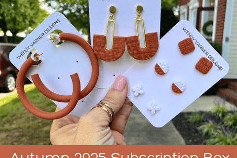  Autumn 2025 Seasons Change polymer clay subscription box with terra cotta hoops, terra cotta boho arch dangles and terra cotta and white stud earrings