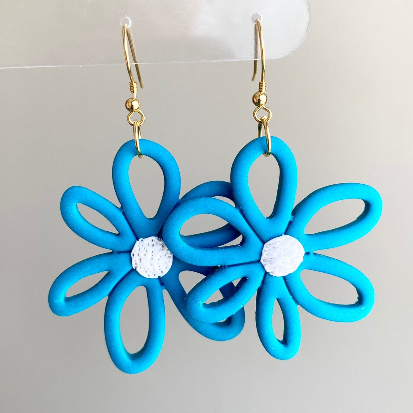 Sea glass blue colored flower daisy polymer clay dangle earrings