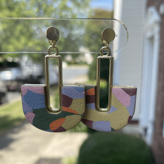 Autumn inspired hand-painted polymer clay arch earrings with gold rectangle accent – front view