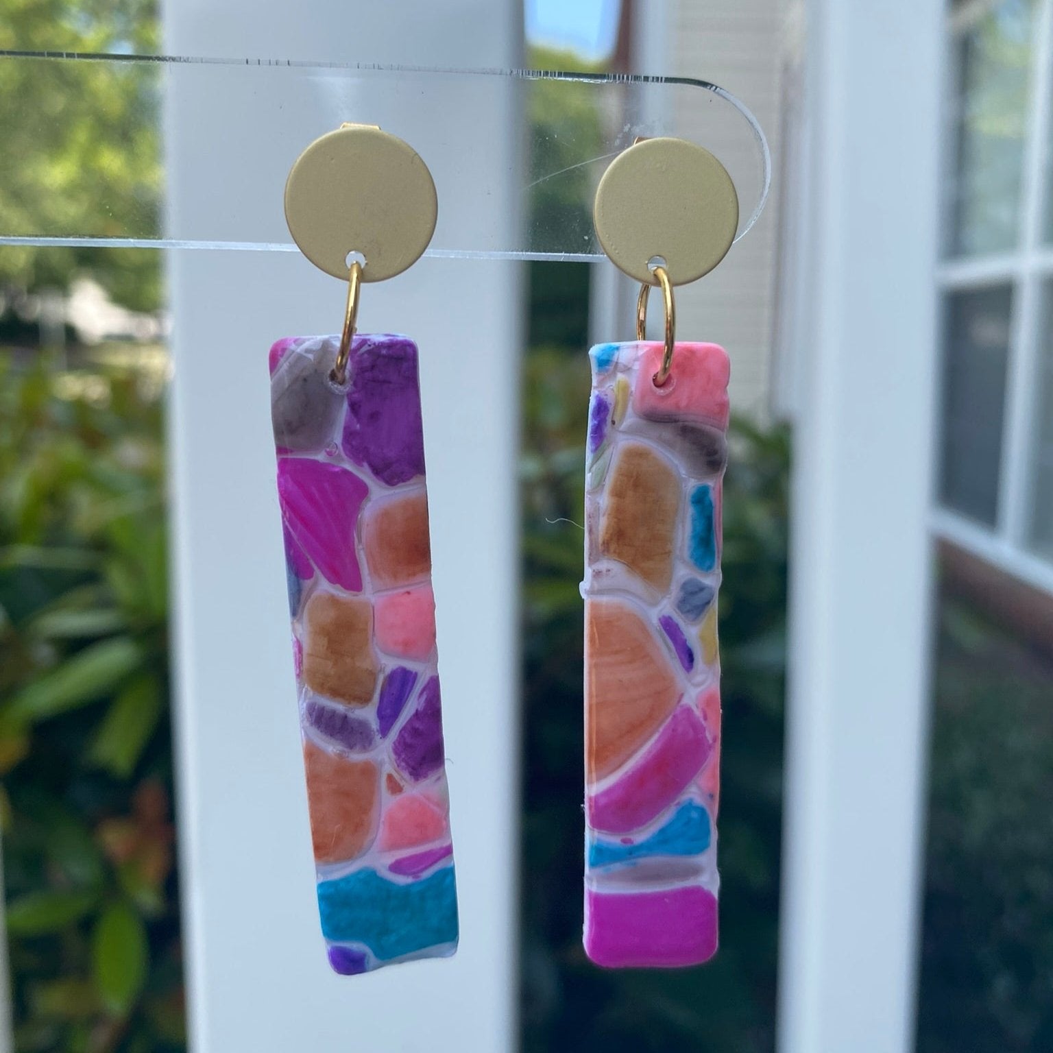 Cobble polymer clay earrings with a vibrant mosaic pattern in pink, purple, orange, and turquoise from The Brush Stroke collection