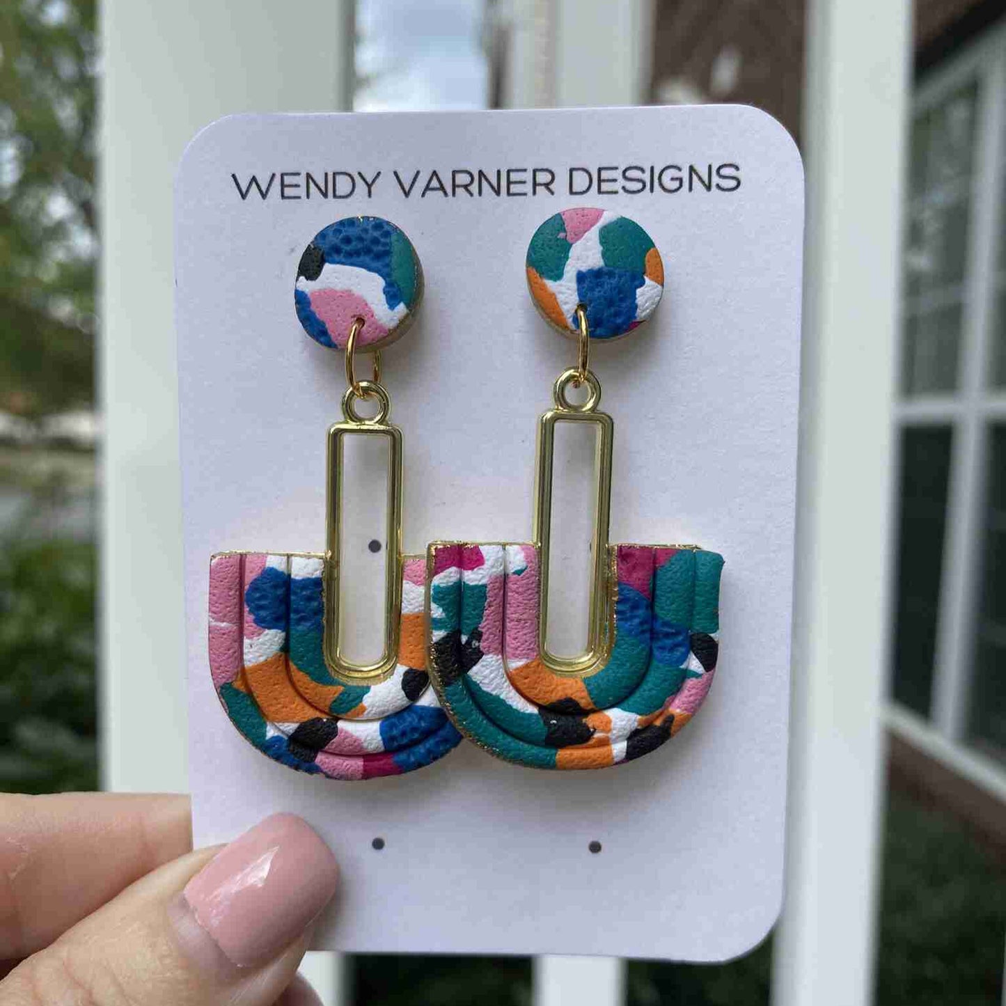Colorful U-shaped polymer clay earrings with gold rectangle link – front view