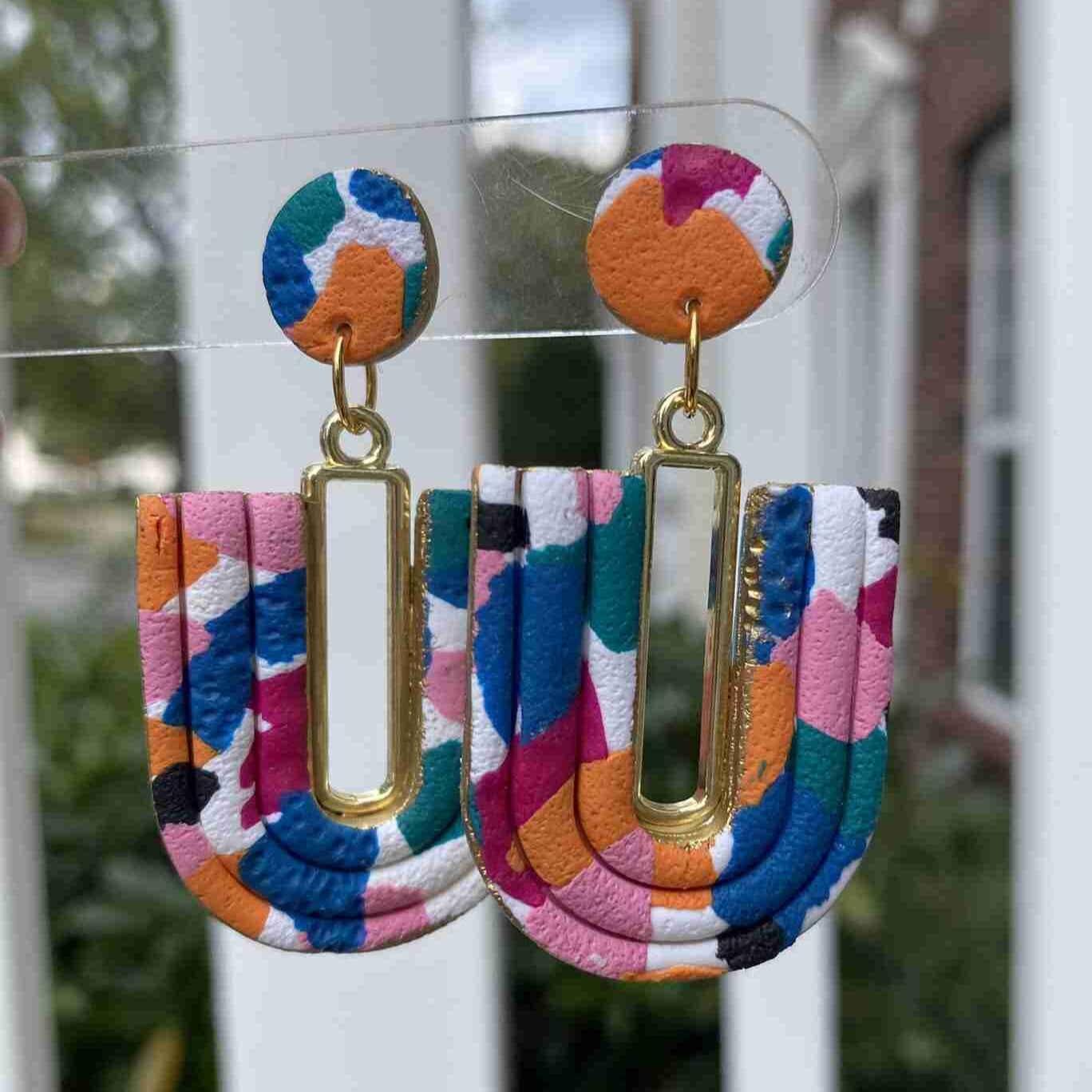 Multi-colored handmade U-Loop earrings showing texture and lightweight design