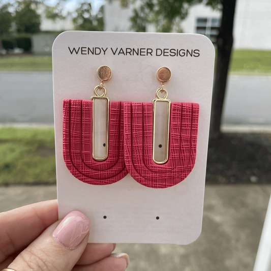 Dark strawberry red textured polymer clay arch earrings with gold-plated rectangle accents and gold posts, handmade by Wendy Varner Designs in Charlotte NC.