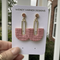 Pink textured half-moon polymer clay earrings with gold-tone rectangular accents, handmade in Charlotte NC