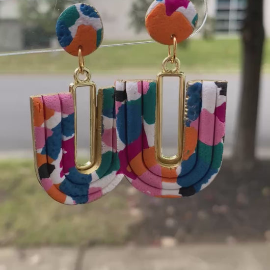 Multi-colored handmade U-Loop earrings showing texture and lightweight design