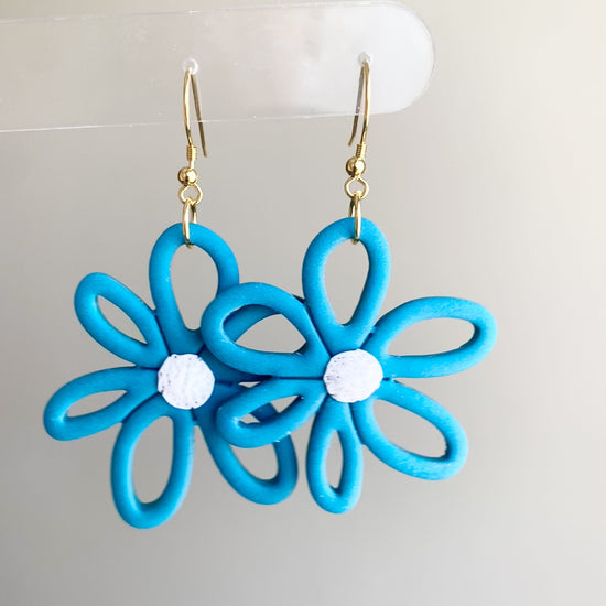 Sea glass blue colored flower daisy polymer clay dangle earrings