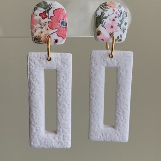Springtime floral and textured white polymer clay dangle earrings