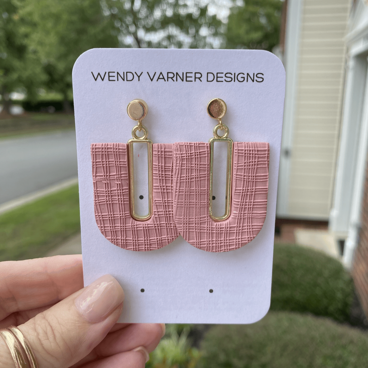 Rose blush textured polymer clay arch earrings with gold-plated rectangle accents and gold posts, handmade by Wendy Varner Designs in Charlotte NC.