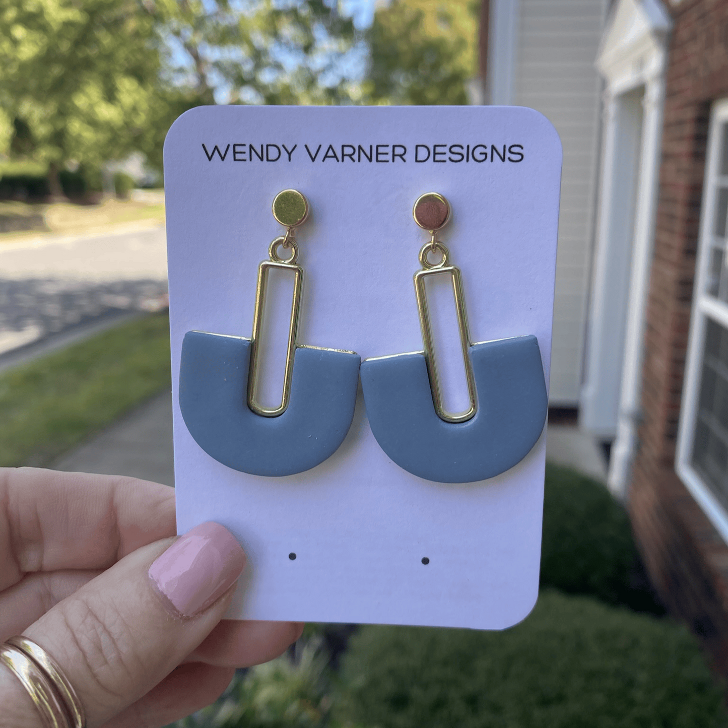 Steel blue polymer clay earrings on product display card from Wendy Varner Designs