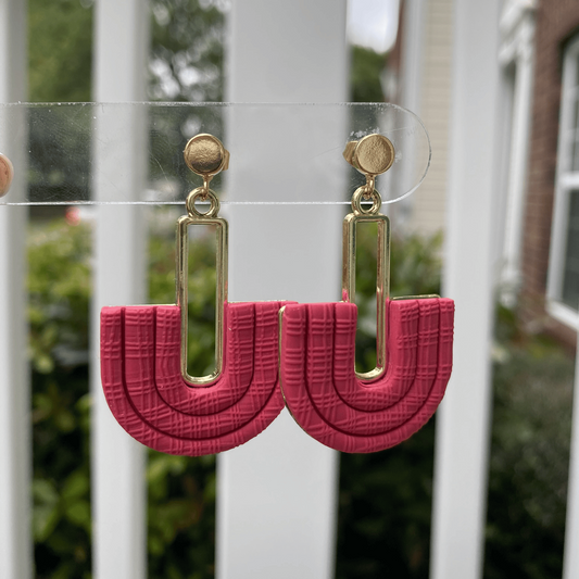 Strawberry Red half-arch polymer clay earrings with gold-plated connector on earring card – handmade in Charlotte NC.