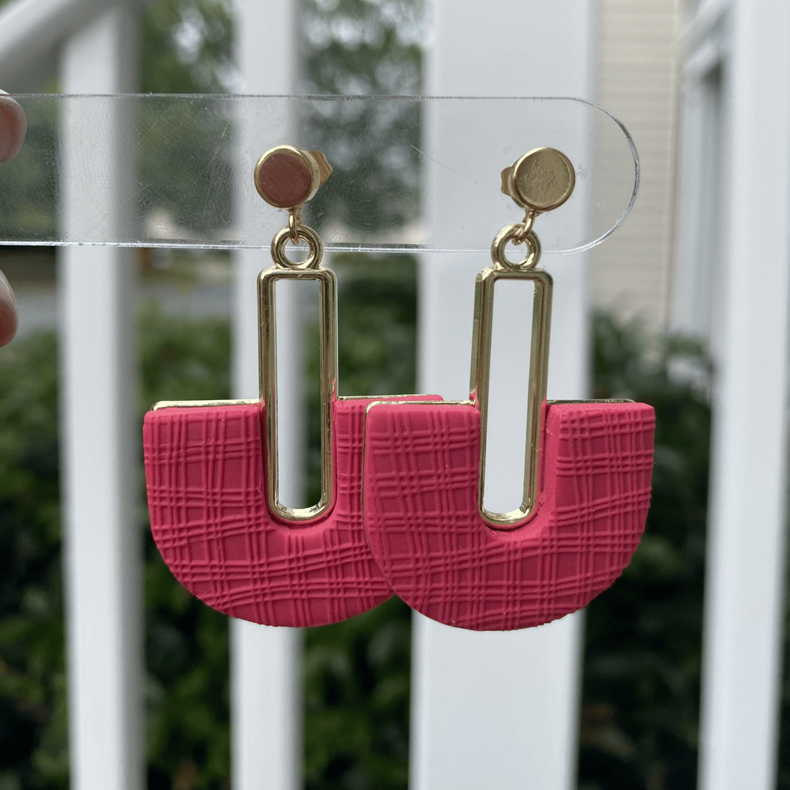 Handmade Strawberry Red half-arch polymer clay earrings with gold geometric connector – lightweight statement jewelry.