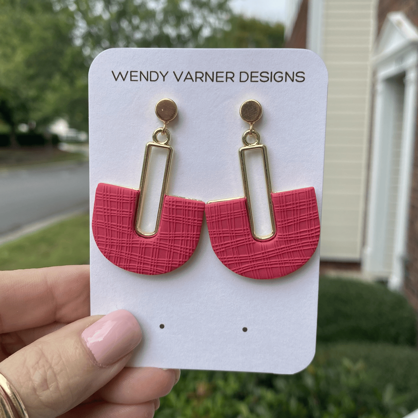Handmade Strawberry Red half-arch polymer clay earrings with gold geometric connector – lightweight statement jewelry.