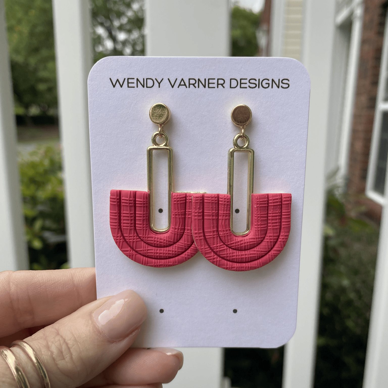 Handmade Strawberry Red half-arch polymer clay earrings with gold geometric connector – lightweight statement jewelry.